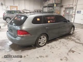 2010 Volkswagen Jetta SportWagen TDI with VIN 3VWTL7AJ7AM672069, listed as a IAAI auction lot 41858880 with 1 mi miles. Bid and sale history available at carsss.com. Image 4.