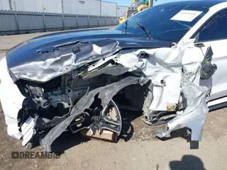 2016 Ford Mustang EcoBoost z VIN 1FA6P8TH3G5221133, wystawiony jako IAAI lot #42325336 z przebiegiem 135 065 mil mil oraz . Historia ofert i sprzedaży dostępna na DreamBid. Obrazek 6.