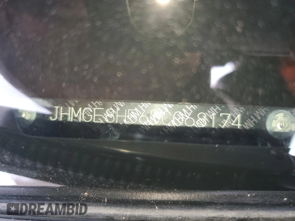 2013 Honda Fit Sport with VIN JHMGE8H56DC068174, listed as a Copart auction lot 50687815 with 106,629 mi miles and Salvage Title. Bid and sale history available at carsss.com. Image 14.