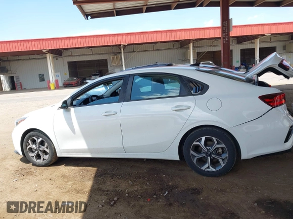 2020 Kia Forte LXS z VIN 3KPF24ADXLE152263, wystawiony jako IAAI lot #42218444 z przebiegiem 88 828 mil mil oraz . Historia ofert i sprzedaży dostępna na DreamBid. Obrazek 13.