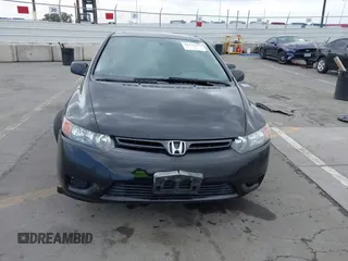 2008 Honda Civic Cpe EX with VIN 2HGFG12858H556294, listed as a IAAI auction lot 42121231 with 121,496 mi miles. Bid and sale history available at carsss.com. Image 6.