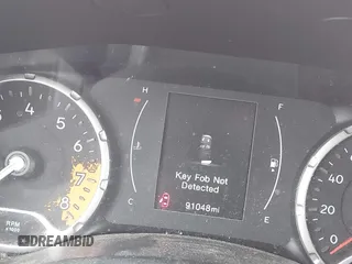 2015 Jeep Renegade Latitude with VIN ZACCJABT9FPB41532, listed as a IAAI auction lot 41977393 with 91,048 mi miles. Bid and sale history available at carsss.com. Image 14.