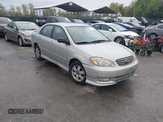 2003 Toyota Corolla CE with VIN 2T1BR32E13C038971, listed as a IAAI auction lot 42027458 with 227,808 mi miles. Bid and sale history available at carsss.com. Image 1.