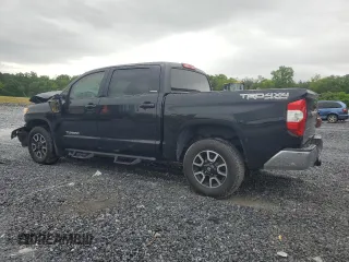 2017 Toyota Tundra Limited with VIN 5TFHW5F10HX675896, listed as a Copart auction lot 58703375 with 106,971 mi miles and Salvage title. Bid and sale history available at DreamBid. Image 2.