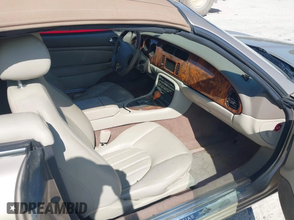 2002 Jaguar XK with VIN SAJDA42C32NA24378, listed as a IAAI auction lot 42205854 with 92,612 mi miles and . Bid and sale history available at DreamBid. Image 5.