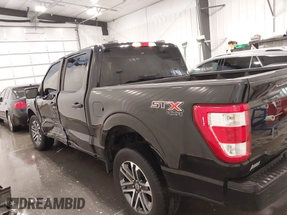 2021 Ford F-150 XL with VIN 1FTFW1E51MFD11166, listed as a IAAI auction lot 41883197 with 33,303 mi miles. Bid and sale history available at carsss.com. Image 15.