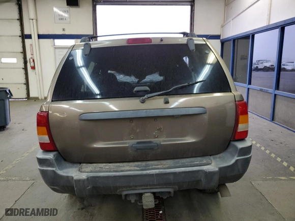 2001 Jeep Grand Cherokee Laredo with VIN 1J4GW48N01C529690, listed as a Copart auction lot 82037774 with 142,673 mi miles and Salvage Title. Bid and sale history available at carsss.com. Image 6.