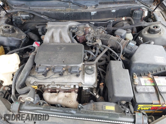 1996 Toyota Camry LE z VIN 4T1EF12K9TU117514, wystawiony jako IAAI lot #42241880 z przebiegiem 192 764 mil mil oraz . Historia ofert i sprzedaży dostępna na DreamBid. Obrazek 10.