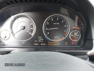 2013 BMW 5 Series 528i with VIN WBAXG5C53DD234207, listed as a IAAI auction lot 41725465 with 116,891 mi miles and . Bid and sale history available at carsss.com. Image 7.
