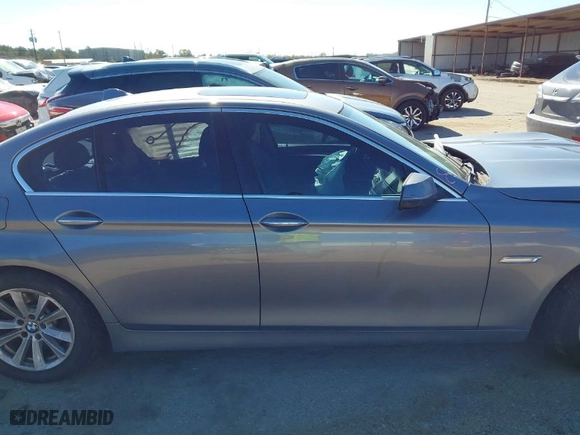 2014 BMW 5 Series 528i with VIN WBA5A5C58ED506079, listed as a IAAI auction lot 41236765 with 157,283 mi miles. Bid and sale history available at carsss.com. Image 13.