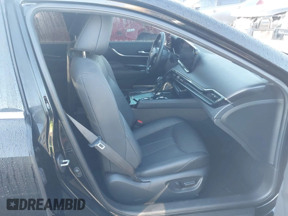2022 Toyota Mirai XLE with VIN JTDAAAAA9NA007013, listed as a IAAI auction lot 41744965 with 23,243 mi miles and . Bid and sale history available at DreamBid. Image 5.