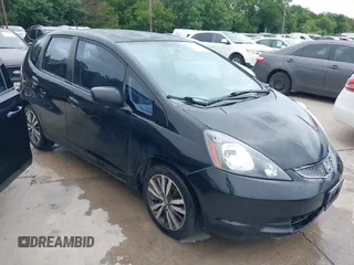 2009 Honda Fit z VIN JHMGE87209S036177, wystawiony jako IAAI lot #42408428 z przebiegiem 184 702 mil mil oraz . Historia ofert i sprzedaży dostępna na DreamBid. Obrazek 1.