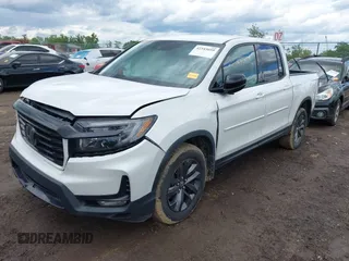 2021 Honda Ridgeline Sport with VIN 5FPYK3F14MB005117, listed as a IAAI auction lot 42343059 with 58,862 mi miles and . Bid and sale history available at DreamBid. Image 2.