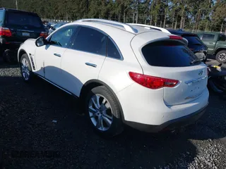 2014 Infiniti QX70 with VIN JN8CS1MW2EM411237, listed as a IAAI auction lot 42011806 with 148,133 mi miles and . Bid and sale history available at carsss.com. Image 3.