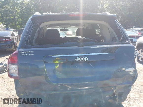 2015 Jeep Compass Latitude with VIN 1C4NJCEBXFD179373, listed as a IAAI auction lot 39380614 with 104,832 mi miles. Bid and sale history available at carsss.com. Image 17.