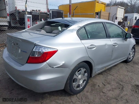 2012 Honda Civic Hybrid with VIN JHMFB4F21CS008894, listed as a IAAI auction lot 41901579 with 336,630 mi miles. Bid and sale history available at carsss.com. Image 4.