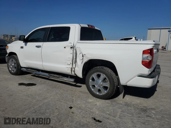 2015 Toyota Tundra 4WD Truck Platinum with VIN 5TFAW5F17FX486418, listed as a Copart auction lot 42779925 with 124,393 mi miles and Salvage Title. Bid and sale history available at carsss.com. Image 2.