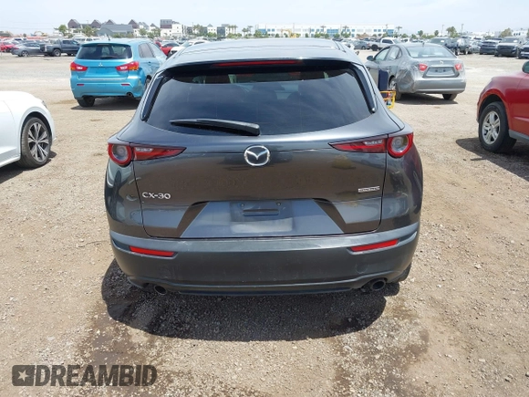 2021 Mazda CX-30 Select with VIN 3MVDMABL5MM210517, listed as a IAAI auction lot 42245033 with 191,303 mi miles and . Bid and sale history available at DreamBid. Image 16.