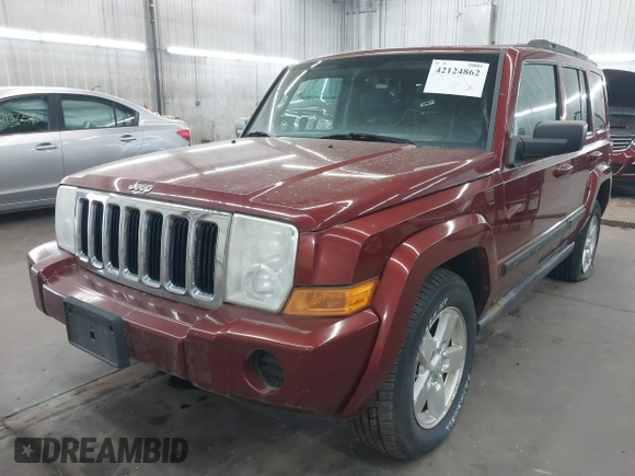 2007 Jeep Commander Sport with VIN 1J8HG48K97C518217, listed as a IAAI auction lot 42124862 with 198,371 mi miles. Bid and sale history available at carsss.com. Image 2.