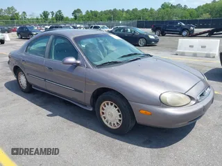 1996 Mercury Sable LS z VIN 1MELM53S2TA652949, wystawiony jako IAAI lot #42127943 z przebiegiem 34 355 mil mil oraz . Historia ofert i sprzedaży dostępna na DreamBid. Obrazek 1.