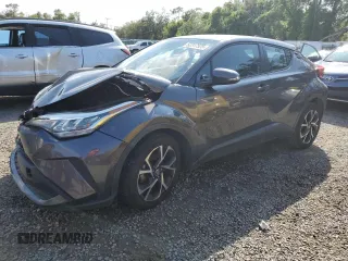 2021 Toyota C-HR LE z VIN NMTKHMBX1MR121205, wystawiony jako Copart lot #52317525 z przebiegiem 73 654 mil mil oraz Nie do naprawy. Historia ofert i sprzedaży dostępna na DreamBid. Obrazek 1.
