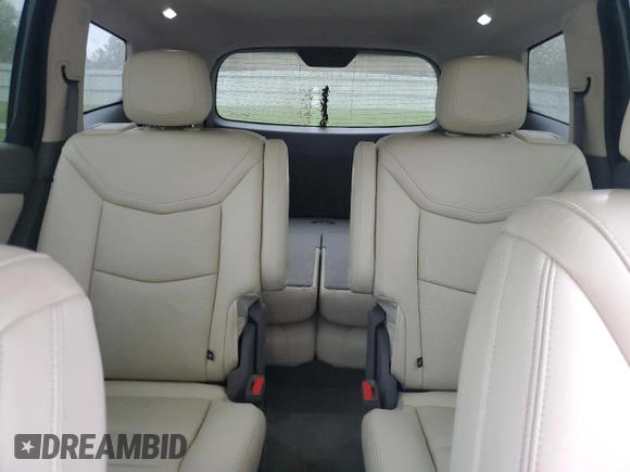 2021 Cadillac XT6 Premium Luxury with VIN 1GYKPDRSXMZ231922, listed as a Copart auction lot 51981065 with 16,784 mi miles and Salvage Title. Bid and sale history available at carsss.com. Image 10.