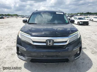 2019 Honda Pilot Touring 8-Passenger with VIN 5FNYF5H94KB029572, listed as a Copart auction lot 54363265 with 149,825 mi miles and Salvage Title. Bid and sale history available at carsss.com. Image 5.