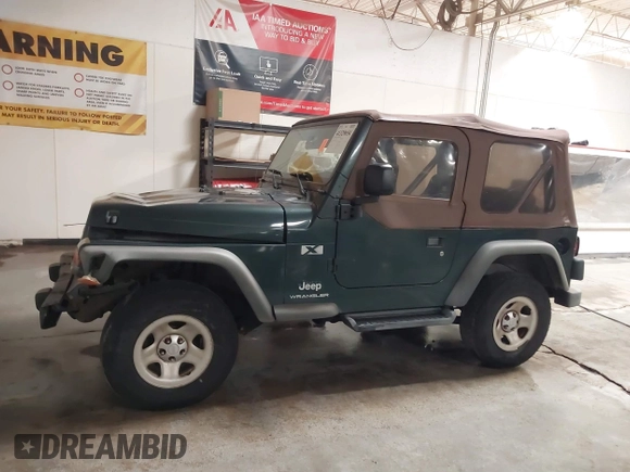 2003 Jeep Wrangler X z VIN 1J4FA39S43P339234, wystawiony jako IAAI lot #41329654 z przebiegiem 175 376 mil mil oraz . Historia ofert i sprzedaży dostępna na DreamBid. Obrazek 14.