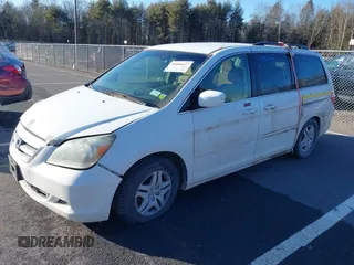 2007 Honda Odyssey EX with VIN 5FNRL38417B055298, listed as a IAAI auction lot 39332584 with 232,760 mi miles. Bid and sale history available at carsss.com. Image 2.