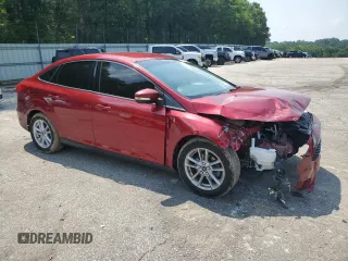 2017 Ford Focus SE with VIN 1FADP3F26HL327333, listed as a Copart auction lot 59206945 with 33,762 mi miles and Salvage title. Bid and sale history available at DreamBid. Image 4.