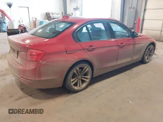 2014 BMW 3 Series 328d xDrive with VIN WBA3D5C52EKX99245, listed as a IAAI auction lot 41003734 with 173,483 mi miles and . Bid and sale history available at DreamBid. Image 4.