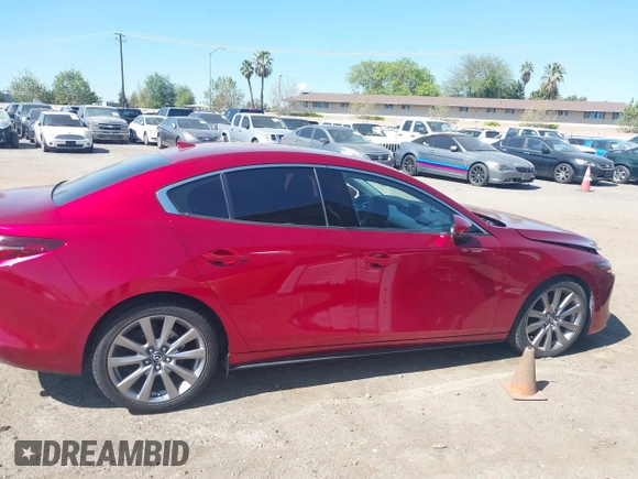 2019 Mazda 3 Premium with VIN JM1BPBEM7K1119186, listed as a IAAI auction lot 41862021 with 39,248 mi miles and . Bid and sale history available at DreamBid. Image 13.