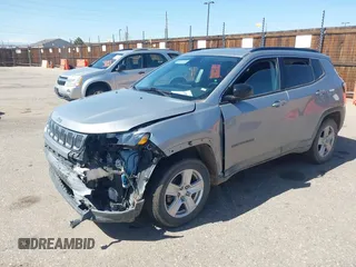 2022 Jeep Compass Latitude with VIN 3C4NJDBB0NT230866, listed as a IAAI auction lot 41979792 with 53,146 mi miles and . Bid and sale history available at DreamBid. Image 2.
