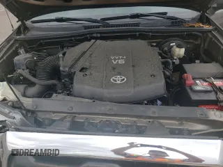 2013 Toyota Tacoma z VIN 3TMLU4EN4DM124465, wystawiony jako Copart lot #58167135 z przebiegiem 116 098 mil mil oraz Szkoda całkowita • Salvage title. Historia ofert i sprzedaży dostępna na DreamBid. Obrazek 11.