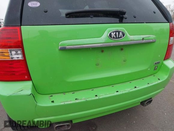 2008 Kia Sportage LX with VIN KNDJE723287471835, listed as a IAAI auction lot 41268401 with 200,404 mi miles and . Bid and sale history available at DreamBid. Image 6.