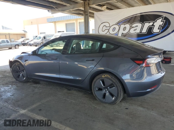 2023 Tesla Model 3 with VIN 5YJ3E1EA4PF456228, listed as a Copart auction lot 61442085 with 121,173 mi miles and Clean title. Bid and sale history available at DreamBid. Image 2.