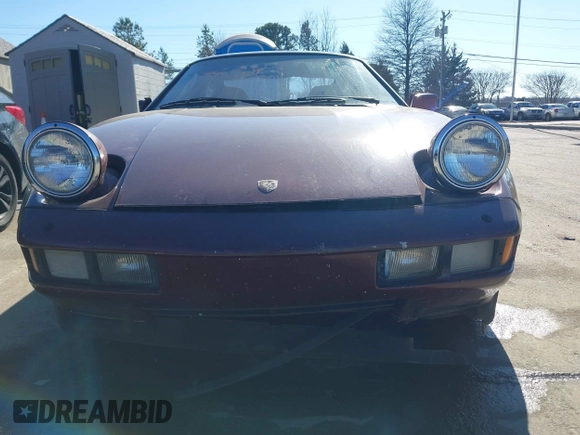1984 Porsche 928 z VIN WP0JB0925ES860300, wystawiony jako IAAI lot #41581309 z przebiegiem 115 151 mil mil oraz . Historia ofert i sprzedaży dostępna na DreamBid. Obrazek 11.