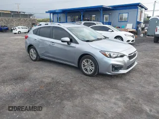 2018 Subaru Impreza Premium with VIN 4S3GTAD68J3750806, listed as a IAAI auction lot 41581873 with 63,930 mi miles. Bid and sale history available at carsss.com. Image 1.