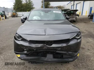 2022 Mazda MX-30 Premium Plus Package with VIN JM1DRADB4N0100893, listed as a Copart auction lot 46955985 with 25,705 mi miles and Salvage Title. Bid and sale history available at carsss.com. Image 5.
