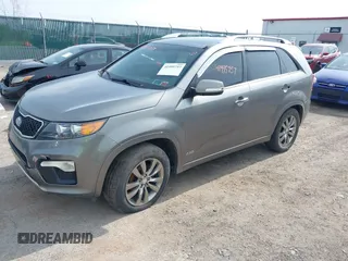 2013 Kia Sorento SX with VIN 5XYKWDA23DG415747, listed as a IAAI auction lot 41995757 with 165,894 mi miles. Bid and sale history available at carsss.com. Image 2.