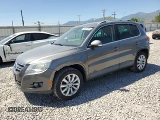 2011 Volkswagen Tiguan SEL w/Premium Navi z VIN WVGAV7AX5BW558240, wystawiony jako Copart lot #59157875 z przebiegiem 134 516 mil mil oraz Czysty tytuł • Clean title. Historia ofert i sprzedaży dostępna na DreamBid. Obrazek 1.