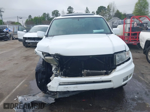 2014 Honda Ridgeline RTL with VIN 5FPYK1F58EB011186, listed as a IAAI auction lot 41903178 with 113,364 mi miles. Bid and sale history available at carsss.com. Image 12.