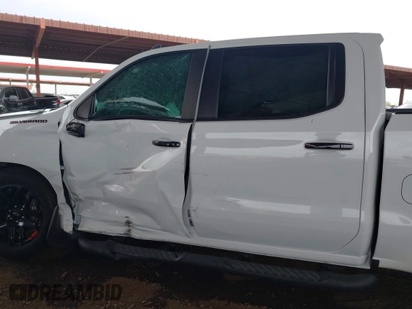 2023 Chevrolet Silverado 1500 with VIN 1GCPADE89PZ115977, listed as a IAAI auction lot 42025071 with 27,635 mi miles and . Bid and sale history available at DreamBid. Image 14.