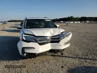 2020 Honda Pilot Touring 8-Passenger with VIN 5FNYF5H98LB022755, listed as a Copart auction lot 44343355 with 78,095 mi miles and Salvage Title. Bid and sale history available at DreamBid. Image 12.