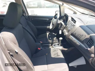 2019 Honda Fit LX z VIN 3HGGK5H42KM733455, wystawiony jako IAAI lot #42644157 z przebiegiem 51 036 mil mil oraz . Historia ofert i sprzedaży dostępna na DreamBid. Obrazek 5.