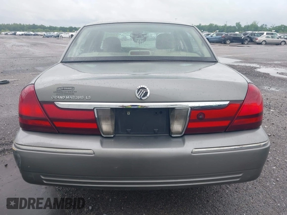 2004 Mercury Grand Marquis LS Premium z VIN 2MEHM75W64X654827, wystawiony jako IAAI lot #41890046 z przebiegiem Nie podano mil oraz . Historia ofert i sprzedaży dostępna na DreamBid. Obrazek 15.