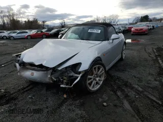 2004 Honda S2000 with VIN JHMAP21494T003284, listed as a Copart auction lot 85004764 with 153,976 mi miles and Salvage Title. Bid and sale history available at DreamBid. Image 1.