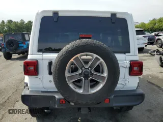 2020 Jeep Wrangler Unlimited Sahara with VIN 1C4HJXEG3LW243396, listed as a Copart auction lot 58709415 with 28,725 mi miles and Salvage title. Bid and sale history available at DreamBid. Image 6.