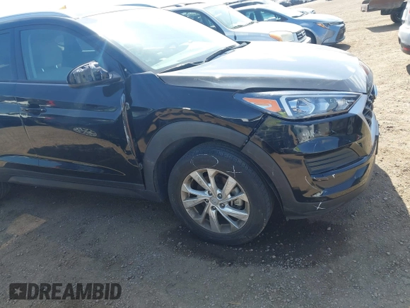 2021 Hyundai Tucson Value with VIN KM8J33A45MU391039, listed as a IAAI auction lot 42086825 with 16,910 mi miles. Bid and sale history available at carsss.com. Image 17.