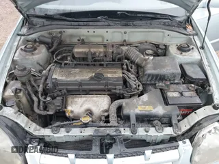 2003 Hyundai Accent GL with VIN KMHCG45C43U465523, listed as a IAAI auction lot 40883056 with 95,770 mi miles. Bid and sale history available at carsss.com. Image 10.
